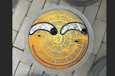 用PS在井盖上涂鸦的操作方法